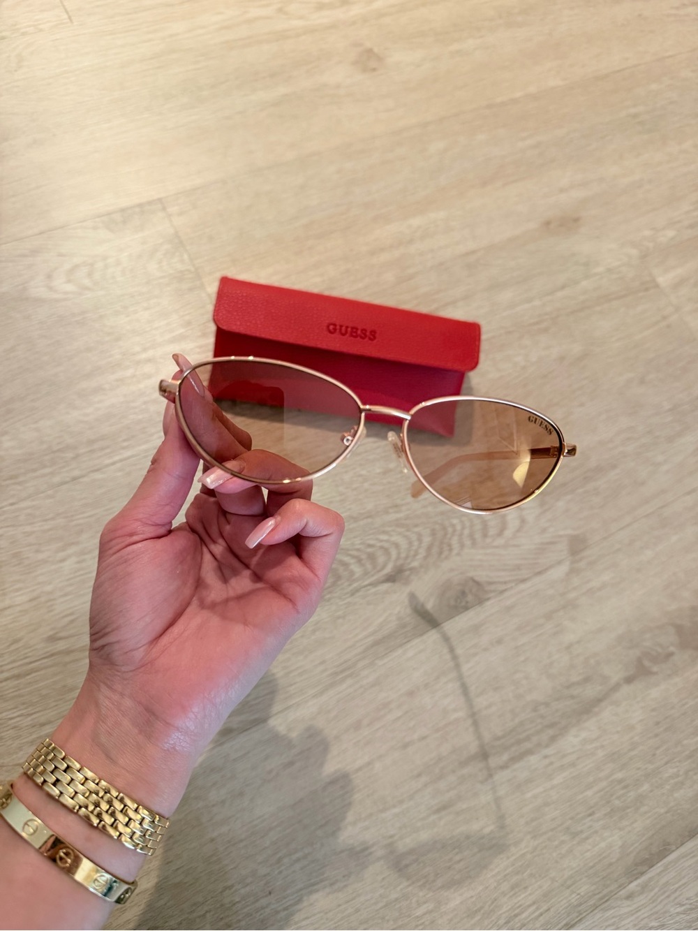 Guess Women’s Rose Gold Frame Sunglasses with Pink-Tinted Lenses